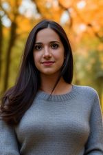 AI generated headshot photograph of a woman wearing a sweater in the forest