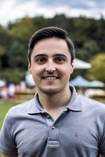 AI generated headshot photograph of a man wearing a polo in the park